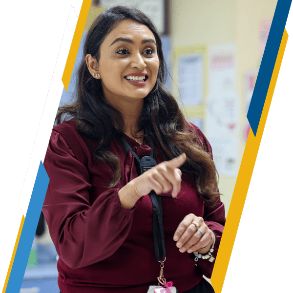 Elementary school educator teaching in the classroom